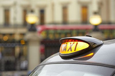 Black cab taxi sign